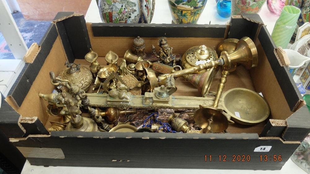 A collection of brass religious items