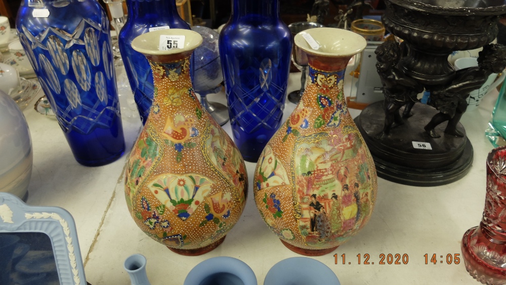 A pair of Satsuma style vases