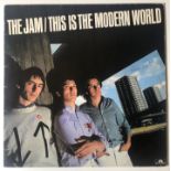 THE JAM THIS IS THE MODERN WORLD SIGNED LP.