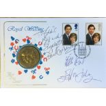 ELTON JOHN. A 1981 Royal Wedding FDC with coin, signed to envelope by Elton John and David Emmanuel.