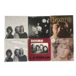 THE DOORS. Seventeen LPs, one 12" both UK and US issue.