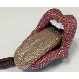 ROLLING STONES TELEPHONE. A novelty telephone in the style of the Rolling Stones tongue design.