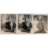 MARILYN MONROE PRESS PHOTOS. Three photographs depicting Marilyn Monroe. One original (18.