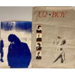 U2 POSTERS. Two U2 posters, Strength of Our Youth (1982, 14 x 21"), Boy (1980, 19 x 28").