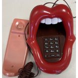 ROLLING STONES TELEPHONE. A novelty telephone in the style of the Rolling Stones tongue design.