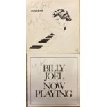 BILLY JOEL SIGNED LPS. Two LPs, each signed clearly in black ink by Billy Joel.