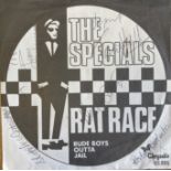 THE SPECIALS SIGNED SINGLE. A copy of The Specials - Rat Race (101.
