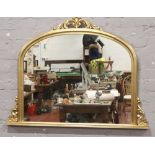 An ornate gilt framed over mantle mirror, 90cm x 118cm.