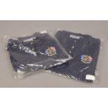 Two Ryder Cup 2001 gold polo shirts. Notes; this tournament was cancelled following the events of