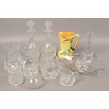 A collection of clear glassware to include Victorian decanters, cut glass jugs and a Burleigh jug.