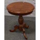 A circular mahogany centre pedestal wine table.