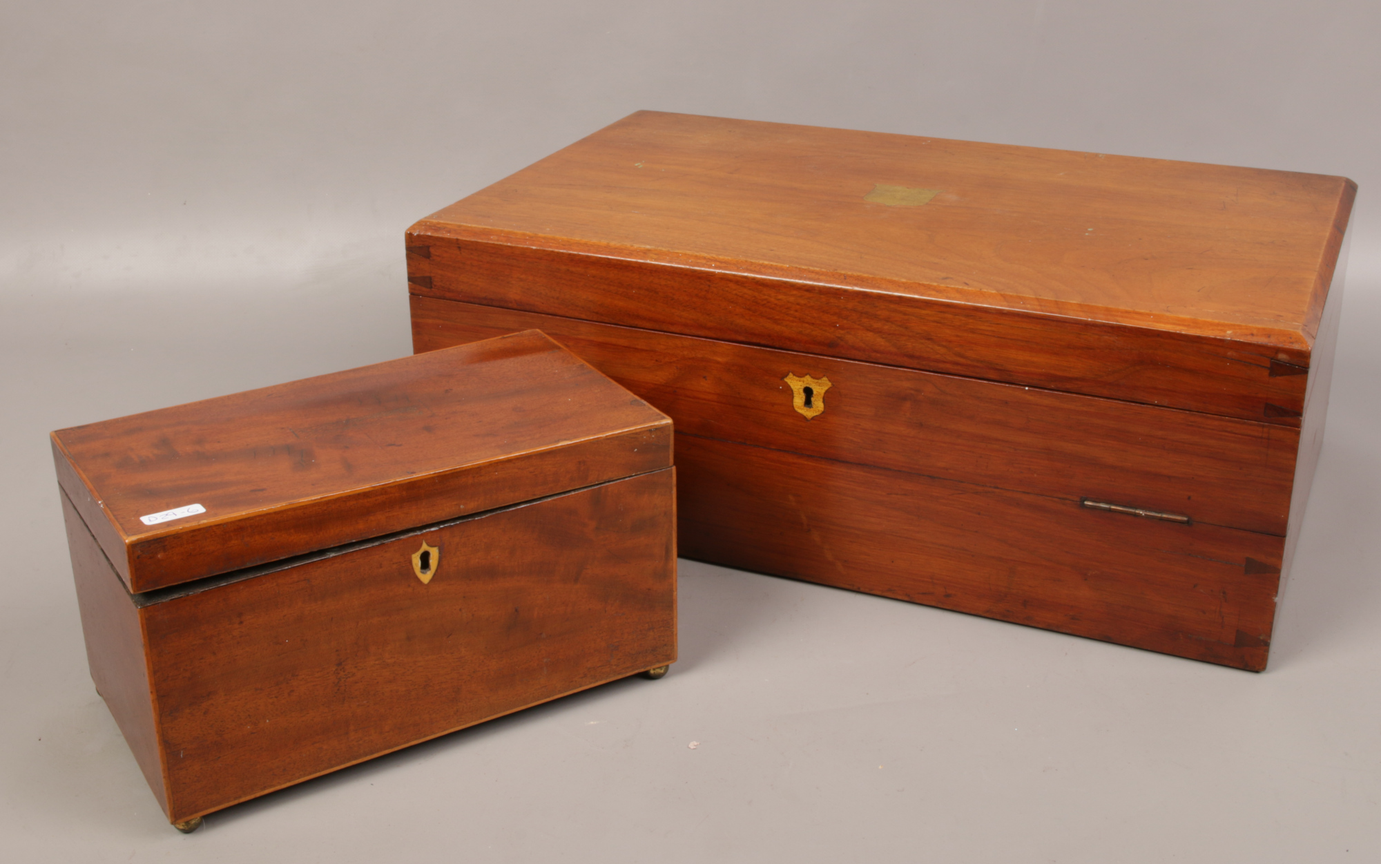 A mahogany cutlery box, along with a Victorian mahogany tea caddy.