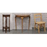 A carved and turned oak plant stand, walnut demilune side table, along with a child's chair.