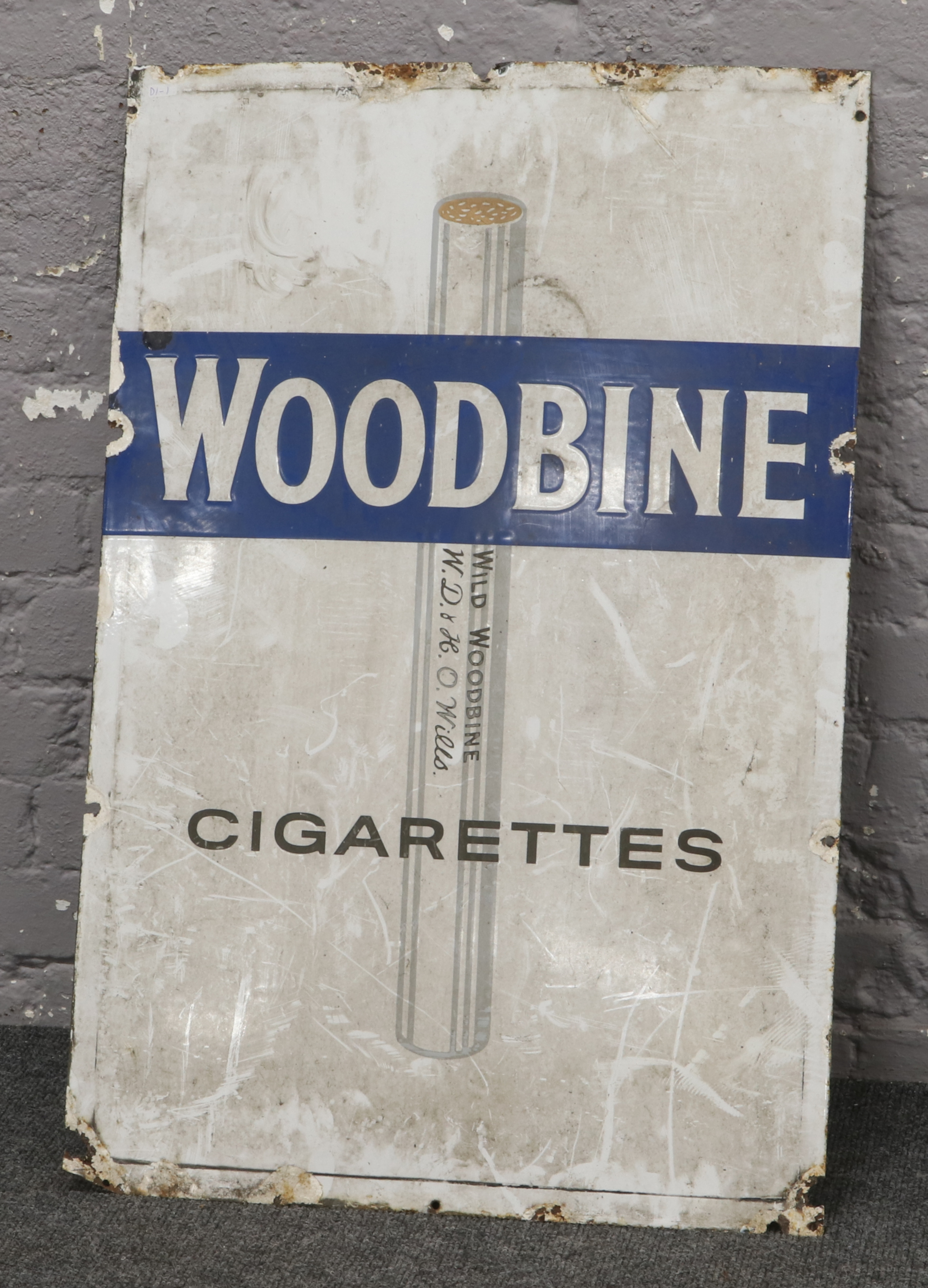 An enamel Wills Woodbine cigarettes advertising sign, 91.5 x 61cm.