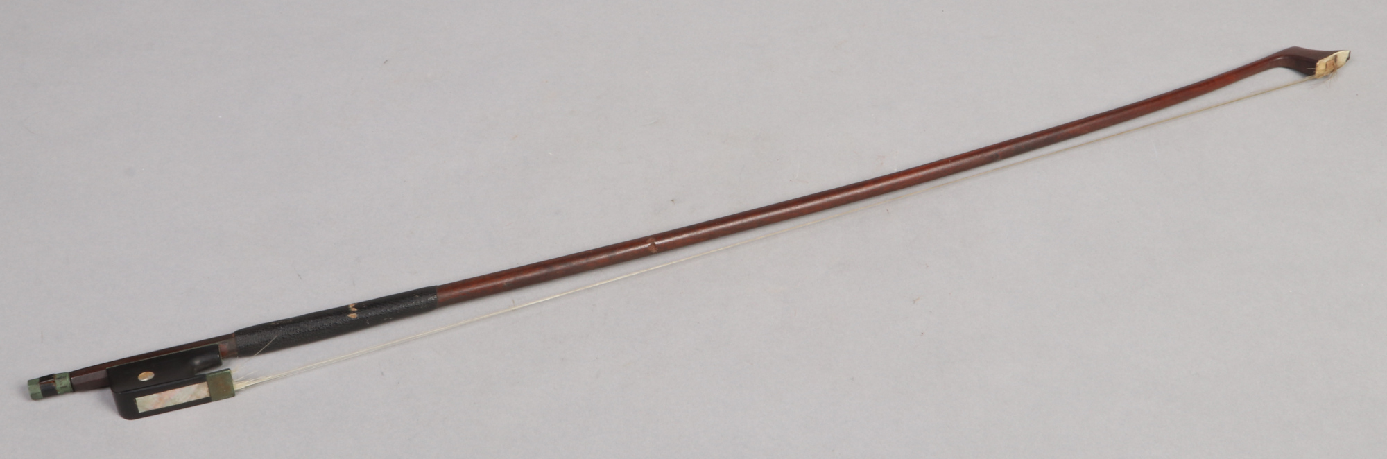 William John Acton (1848-1941) cello bow with mother of pearl inlay and ivory mounted tip. Stamped