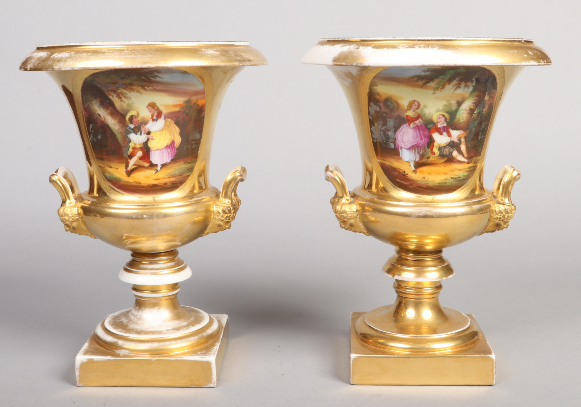 A large pair of 19th century Paris porcelain mantel urns with twin ...