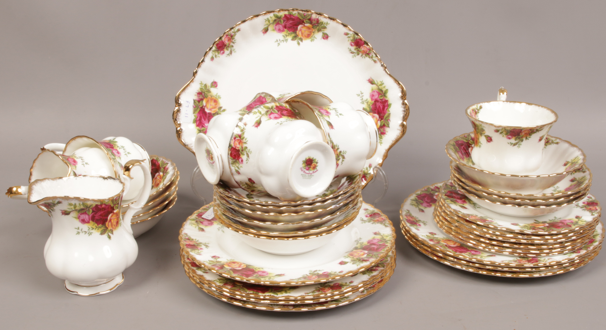 A quantity of Royal Albert Old Country Roses tea wares to include cake stand, cup and saucers, cream