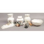 A collection of ceramics to include Beleek, Royal Doulton, Beswick etc.