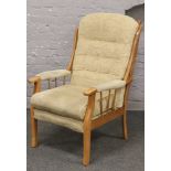 A light oak / ash fire side arm chair.