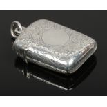 A Victorian silver vesta case with engraved scrollwork. Assayed Birmingham 1895.