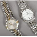 A gentleman's Bulova quartz stainless steel bracelet watch and a Seiko Quartz SQ100 example.