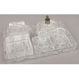 A clear glass 6 piece dressing table set.