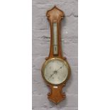 A Lowdon carved oak banjo barometer.