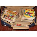 A suitcase of vintage comics to include Buster, Beezer etc.