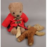 A vintage Paddington Bear and vintage plush teddy bear.