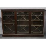 A large astrigal glazed mahogany bookcase.