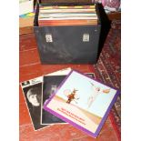 A record collectors carry case and contents of 1960s L.P records Beatles, Rolling Stones,