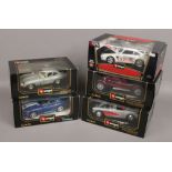 A collection of Burago Diecast cars, Porsche 911, Jaguar, Alfa Romeo examples.
