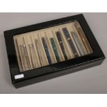 A Levenger fountain pen display box and contents. Including Conway Stewart 388, Parker and