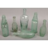 Six glass bottles to include Victorian examples etc.