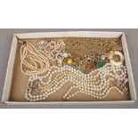 A box of costume jewellery including gilt metal panther necklace, simulated pearls, quartz and