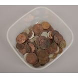 A mixed collection of pre decimal coins.