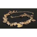 A 1950s silver gilt charm necklace with Noah's Arc theme. The charms formed as thirty pair of