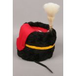 A horse artillery hat faux bear skin with horse hair plume.