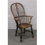 A 19th century Windsor oak armchair.
