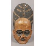A large decorative African wooden tribal mask, Height 70cm.