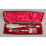 A cased Victorian set of silver plated fish servers with stag antler handles. Maker, Richard