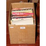 A box of 45rpm singles with cover sleeves, Kylie Minogue, Stevie Wonder, Culture Club etc.