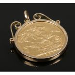 A 1925 full sovereign in 9ct gold mount.