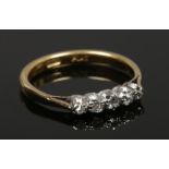 A ladies 18ct gold and platinum five stone diamond ring, size O 3.31 grams.