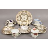 A collection of ceramic cups and saucers to include Rockingham, Noritake etc.