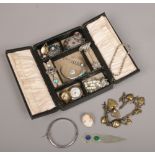 A lather mounted jewellery case and quantity of costume jewellery including cameos, malachite and