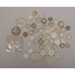 A collection of pre 1947 silver coins to include 3d, florin and half crowns.