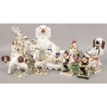 A collection of Staffordshire figures and mantel dogs to include early 19th century pearlware.