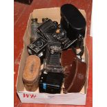 A box of cameras and binoculars to include AGFA Bellows camera, C. P. Goerz Treider binoculars etc.