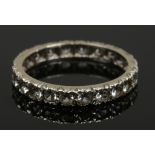 A 9ct white gold and paste eternity ring, size M 1.96 grams.